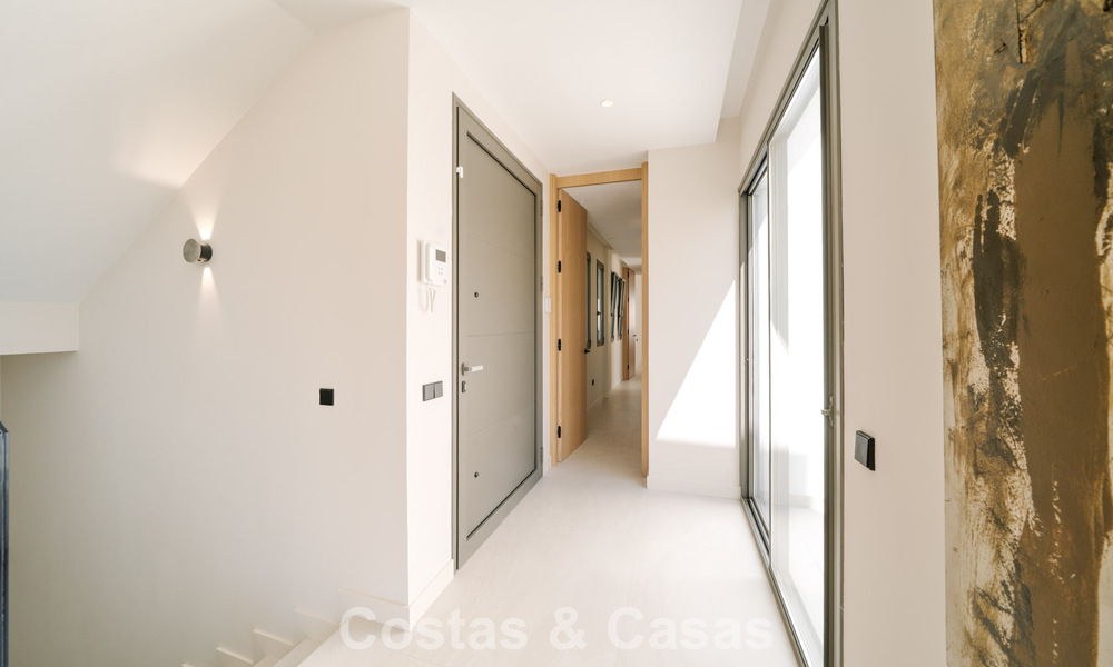 Move-in ready, new-build villa with contemporary architecture for sale with sea viewa and within walking distance of the beach in Estepona 786248