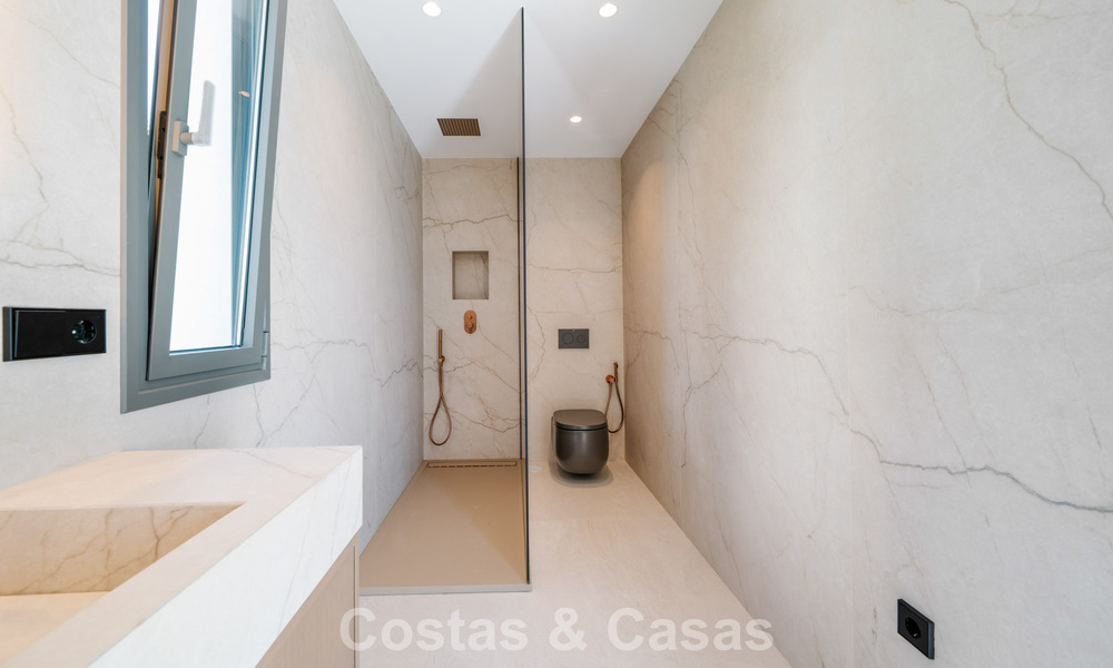 Move-in ready, new-build villa with contemporary architecture for sale with sea viewa and within walking distance of the beach in Estepona 786298