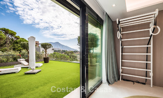 Spacious villa with sea views and a separate guest apartment for sale in El Madroñal in Benahavis - Marbella 786436 