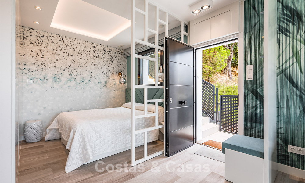Spacious villa with sea views and a separate guest apartment for sale in El Madroñal in Benahavis - Marbella 786450