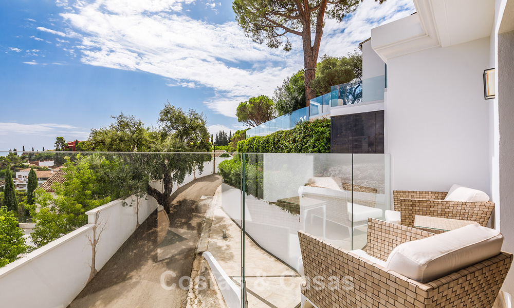 Spacious villa with sea views and a separate guest apartment for sale in El Madroñal in Benahavis - Marbella 786454