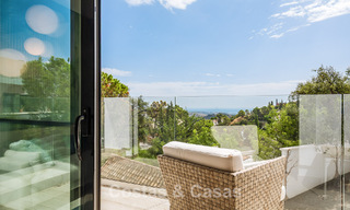 Spacious villa with sea views and a separate guest apartment for sale in El Madroñal in Benahavis - Marbella 786455 
