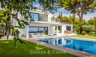 Spacious villa with sea views and a separate guest apartment for sale in El Madroñal in Benahavis - Marbella 786473 
