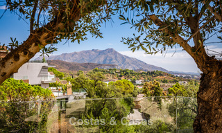 Spacious villa with sea views and a separate guest apartment for sale in El Madroñal in Benahavis - Marbella 786476 