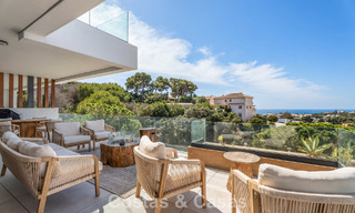 Move-in ready, modernist duplex penthouse with sea views for sale in Marbella East 786483 