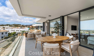 Move-in ready, modernist duplex penthouse with sea views for sale in Marbella East 786488 