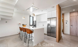 Move-in ready, modernist duplex penthouse with sea views for sale in Marbella East 786491 