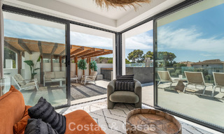 Move-in ready, modernist duplex penthouse with sea views for sale in Marbella East 786506 