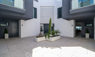 Move-in ready, modernist terraced house with frontal sea views for sale just a few minutes' walk from Estepona town center 786305 