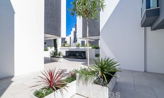 Move-in ready, modernist terraced house with frontal sea views for sale just a few minutes' walk from Estepona town center 786306 