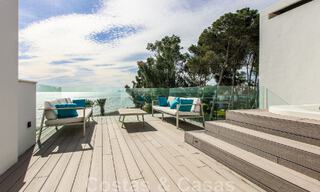 Move-in ready, modernist terraced house with frontal sea views for sale just a few minutes' walk from Estepona town center 786307 