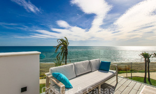 Move-in ready, modernist terraced house with frontal sea views for sale just a few minutes' walk from Estepona town center 786309 