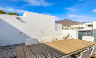 Move-in ready, modernist terraced house with frontal sea views for sale just a few minutes' walk from Estepona town center 786311 