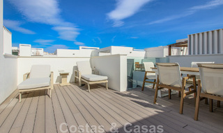 Move-in ready, modernist terraced house with frontal sea views for sale just a few minutes' walk from Estepona town center 786312 