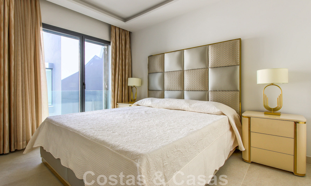 Move-in ready, modernist terraced house with frontal sea views for sale just a few minutes' walk from Estepona town center 786316