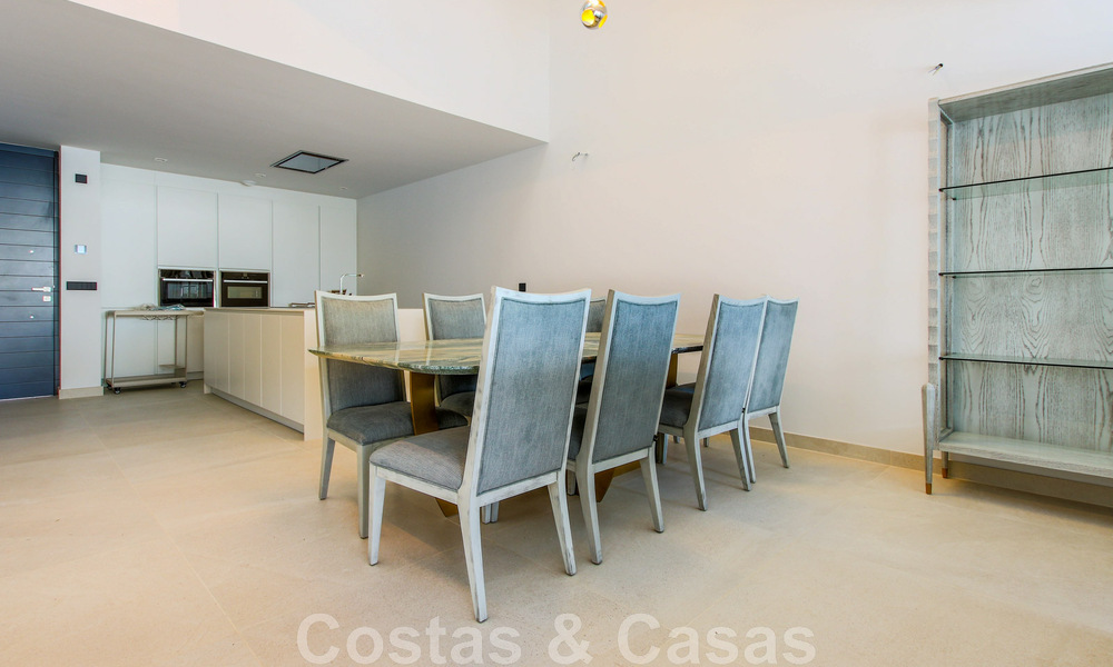 Move-in ready, modernist terraced house with frontal sea views for sale just a few minutes' walk from Estepona town center 786321