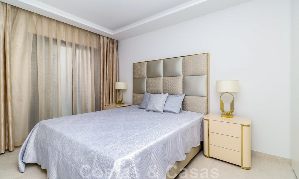 Move-in ready, modernist terraced house with frontal sea views for sale just a few minutes' walk from Estepona town center 786330