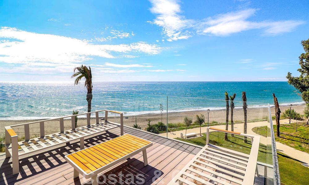 Move-in ready, modernist terraced house with frontal sea views for sale just a few minutes' walk from Estepona town center 786335