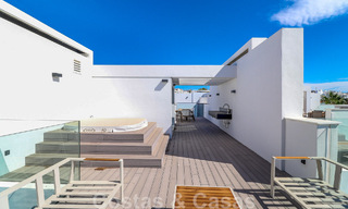 Move-in ready, modernist terraced house with frontal sea views for sale just a few minutes' walk from Estepona town center 786337 