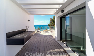 Move-in ready, modernist terraced house with frontal sea views for sale just a few minutes' walk from Estepona town center 786341 