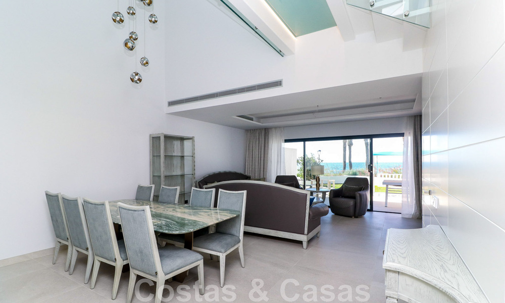 Move-in ready, modernist terraced house with frontal sea views for sale just a few minutes' walk from Estepona town center 786343