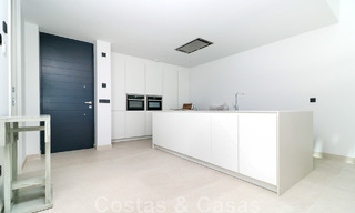 Move-in ready, modernist terraced house with frontal sea views for sale just a few minutes' walk from Estepona town center 786346 