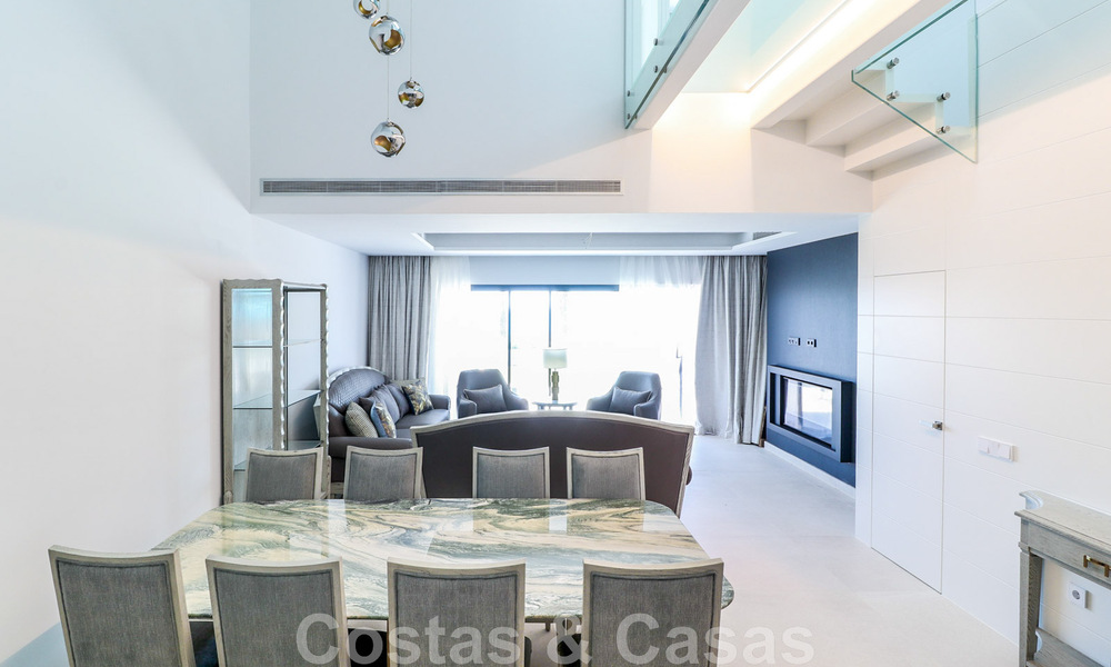 Move-in ready, modernist terraced house with frontal sea views for sale just a few minutes' walk from Estepona town center 786348