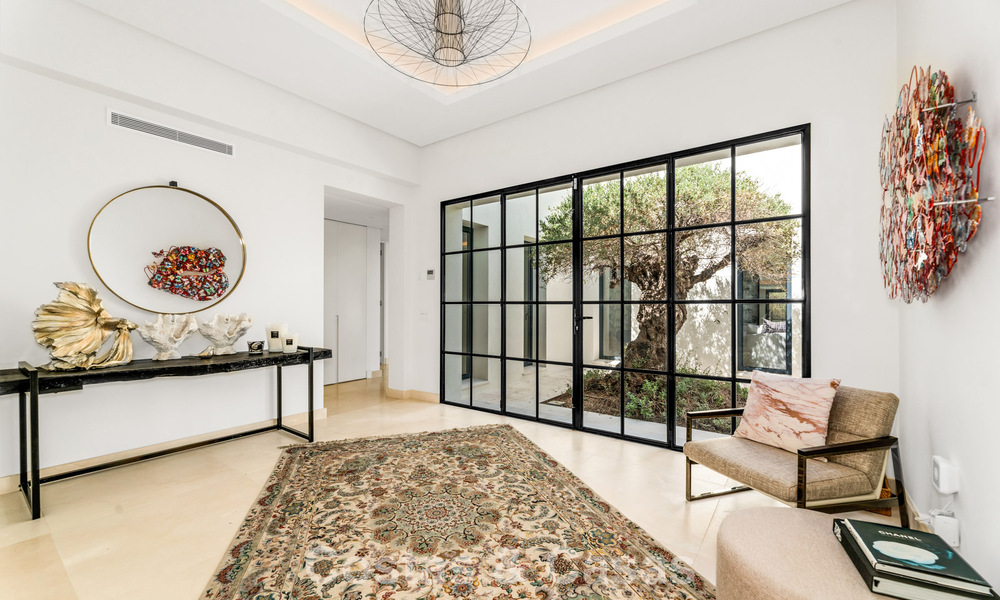 Modernist, single-story luxury villa for sale just steps from the beach east of Marbella center 786774