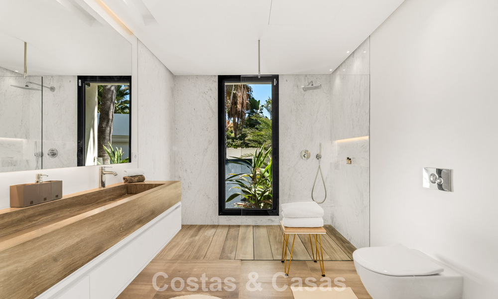 Modernist, single-story luxury villa for sale just steps from the beach east of Marbella center 786793