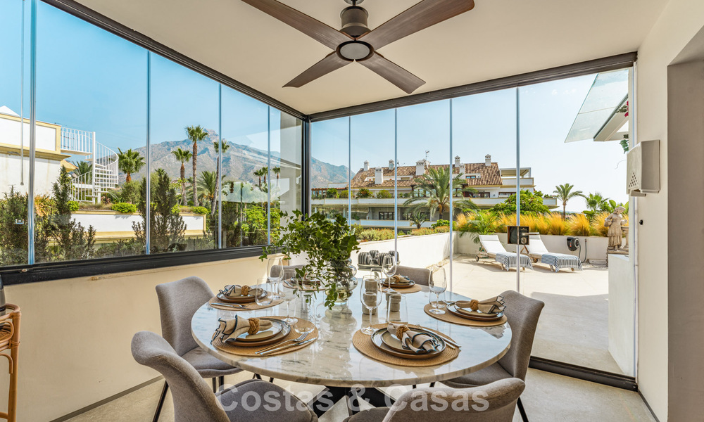Contemporary duplex penthouse for sale in a gated urbanization on Marbella's prestigious Golden Mile 786976