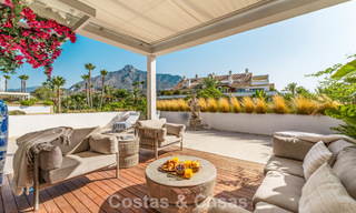 Contemporary duplex penthouse for sale in a gated urbanization on Marbella's prestigious Golden Mile 786979 