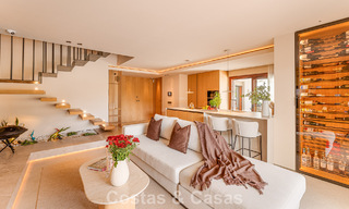 Contemporary duplex penthouse for sale in a gated urbanization on Marbella's prestigious Golden Mile 786983 