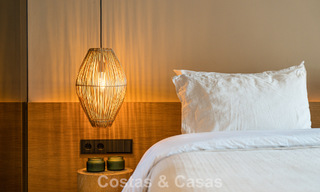 Contemporary duplex penthouse for sale in a gated urbanization on Marbella's prestigious Golden Mile 786986 