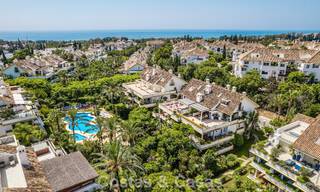 Contemporary duplex penthouse for sale in a gated urbanization on Marbella's prestigious Golden Mile 786988 