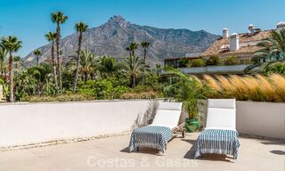 Contemporary duplex penthouse for sale in a gated urbanization on Marbella's prestigious Golden Mile 786991 