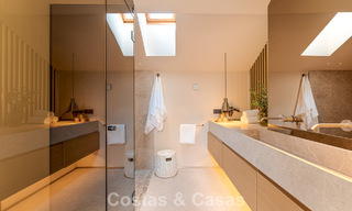 Contemporary duplex penthouse for sale in a gated urbanization on Marbella's prestigious Golden Mile 786992 