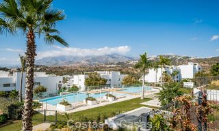 Move-in ready, modern, spacious 4-bedroom apartment for sale with a large private garden in a luxury resort east of Marbella center 787075 
