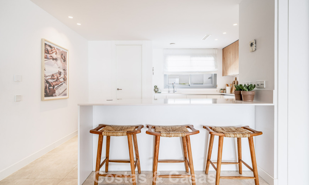 Move-in ready, modern, spacious 4-bedroom apartment for sale with a large private garden in a luxury resort east of Marbella center 787082