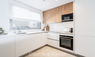 Move-in ready, modern, spacious 4-bedroom apartment for sale with a large private garden in a luxury resort east of Marbella center 787085 