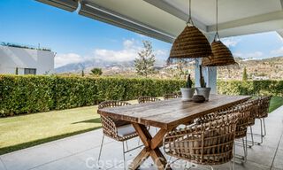 Move-in ready, modern, spacious 4-bedroom apartment for sale with a large private garden in a luxury resort east of Marbella center 787087 
