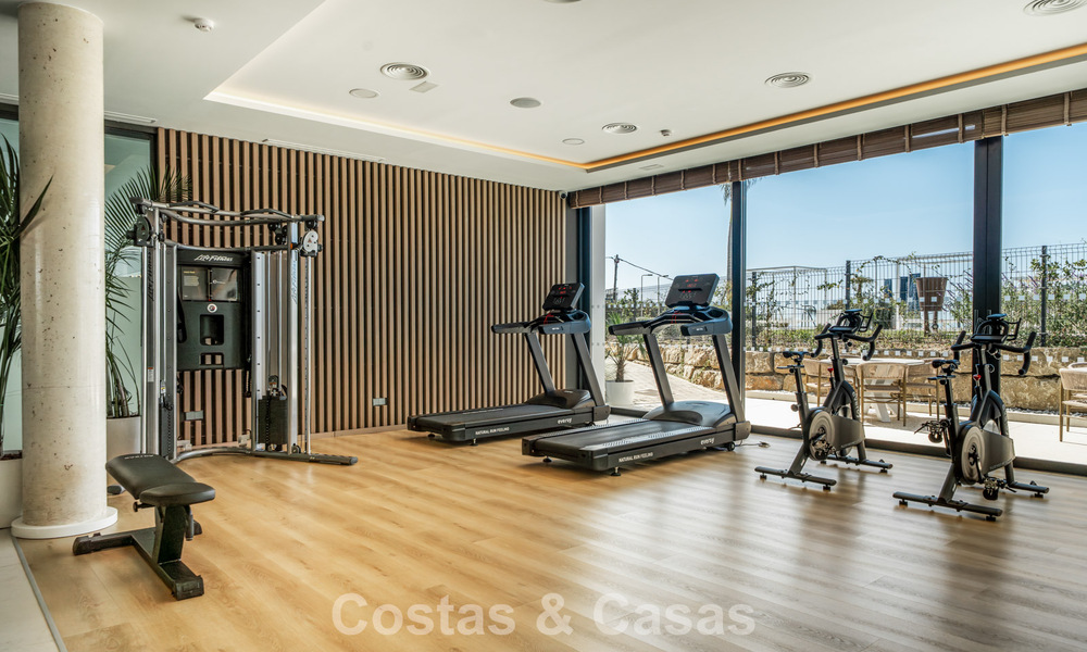 Move-in ready, modern, spacious 4-bedroom apartment for sale with a large private garden in a luxury resort east of Marbella center 787090
