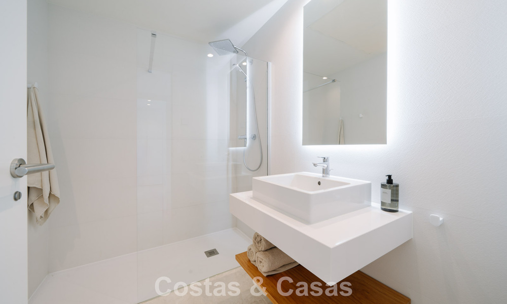 Move-in ready, modern, spacious 4-bedroom apartment for sale with a large private garden in a luxury resort east of Marbella center 787092