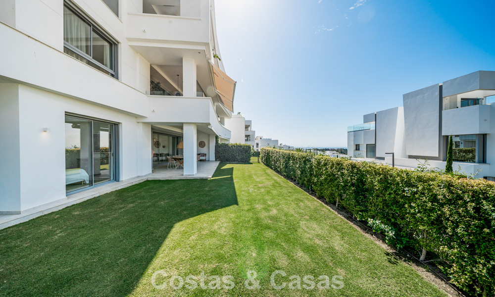 Move-in ready, modern, spacious 4-bedroom apartment for sale with a large private garden in a luxury resort east of Marbella center 787094