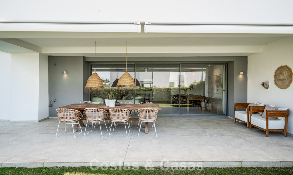Move-in ready, modern, spacious 4-bedroom apartment for sale with a large private garden in a luxury resort east of Marbella center 787096