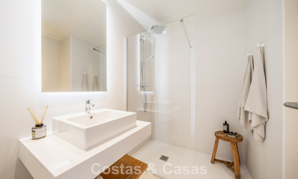 Move-in ready, modern, spacious 4-bedroom apartment for sale with a large private garden in a luxury resort east of Marbella center 787103