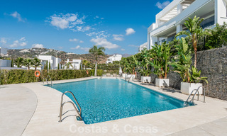 Move-in ready, modern, spacious 4-bedroom apartment for sale with a large private garden in a luxury resort east of Marbella center 787105 