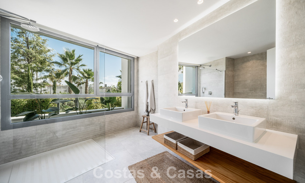 Move-in ready, modern, spacious 4-bedroom apartment for sale with a large private garden in a luxury resort east of Marbella center 787108