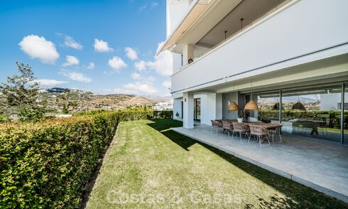 Move-in ready, modern, spacious 4-bedroom apartment for sale with a large private garden in a luxury resort east of Marbella center 787109