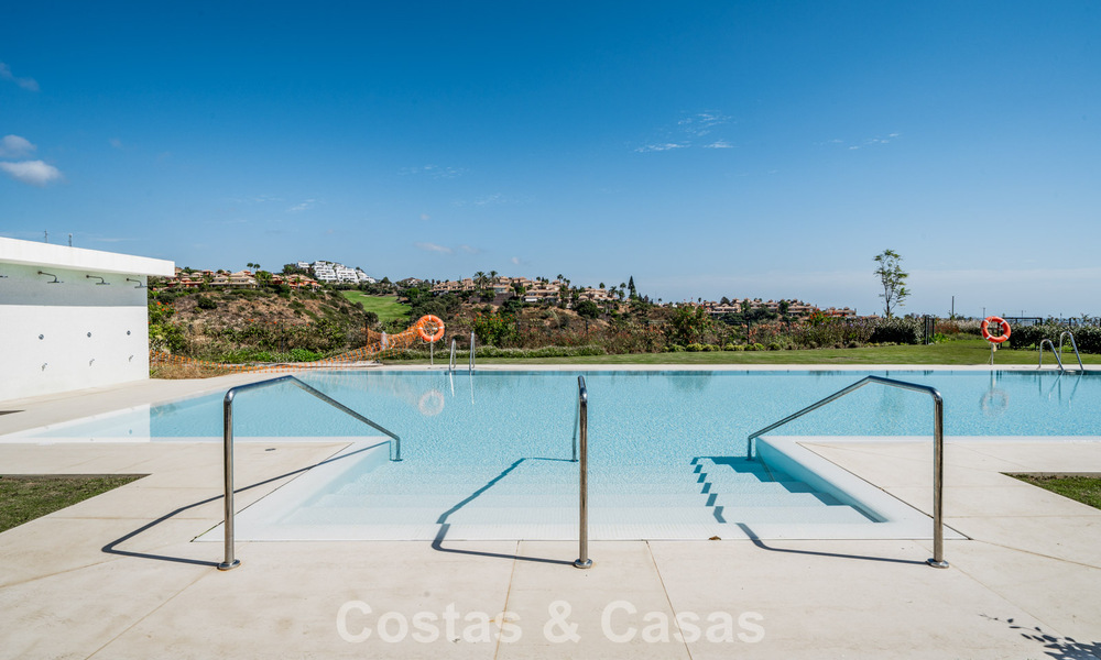 Move-in ready, modern, spacious 4-bedroom apartment for sale with a large private garden in a luxury resort east of Marbella center 787110
