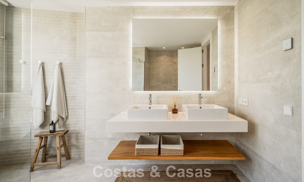 Move-in ready, modern, spacious 4-bedroom apartment for sale with a large private garden in a luxury resort east of Marbella center 787111